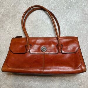 Vintage Wilson’s Italian Leather East West Shoulder Bag in burnt orange burgundy